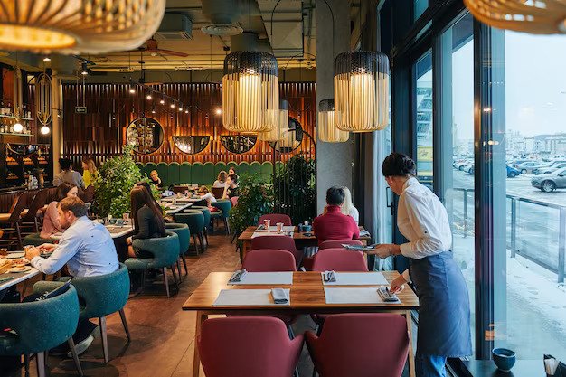 cozy restaurant with people waiter
